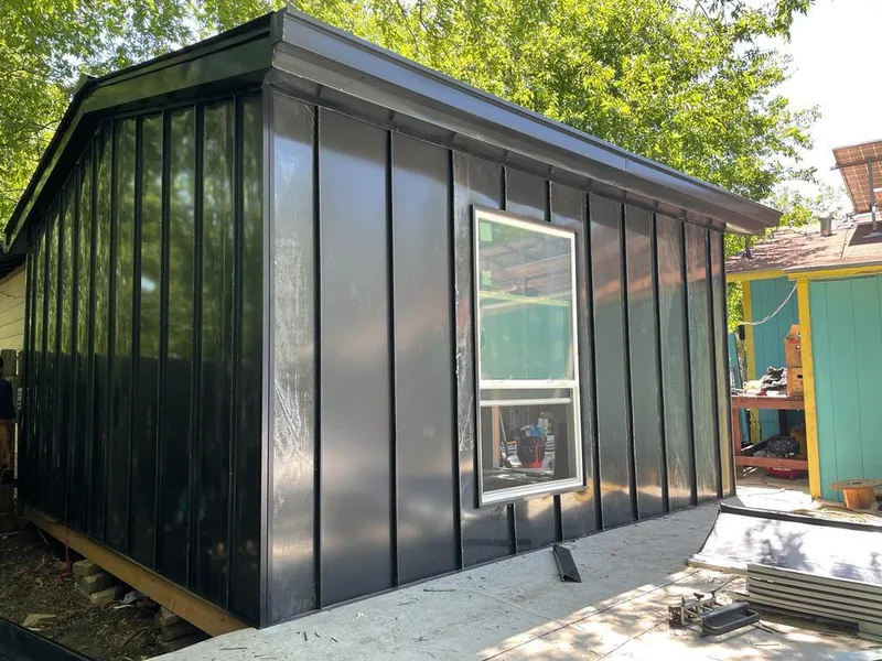 Black standing seam metal wall panels for Roof Inspection in Monroe